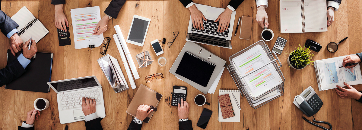 Top view of business people working in office